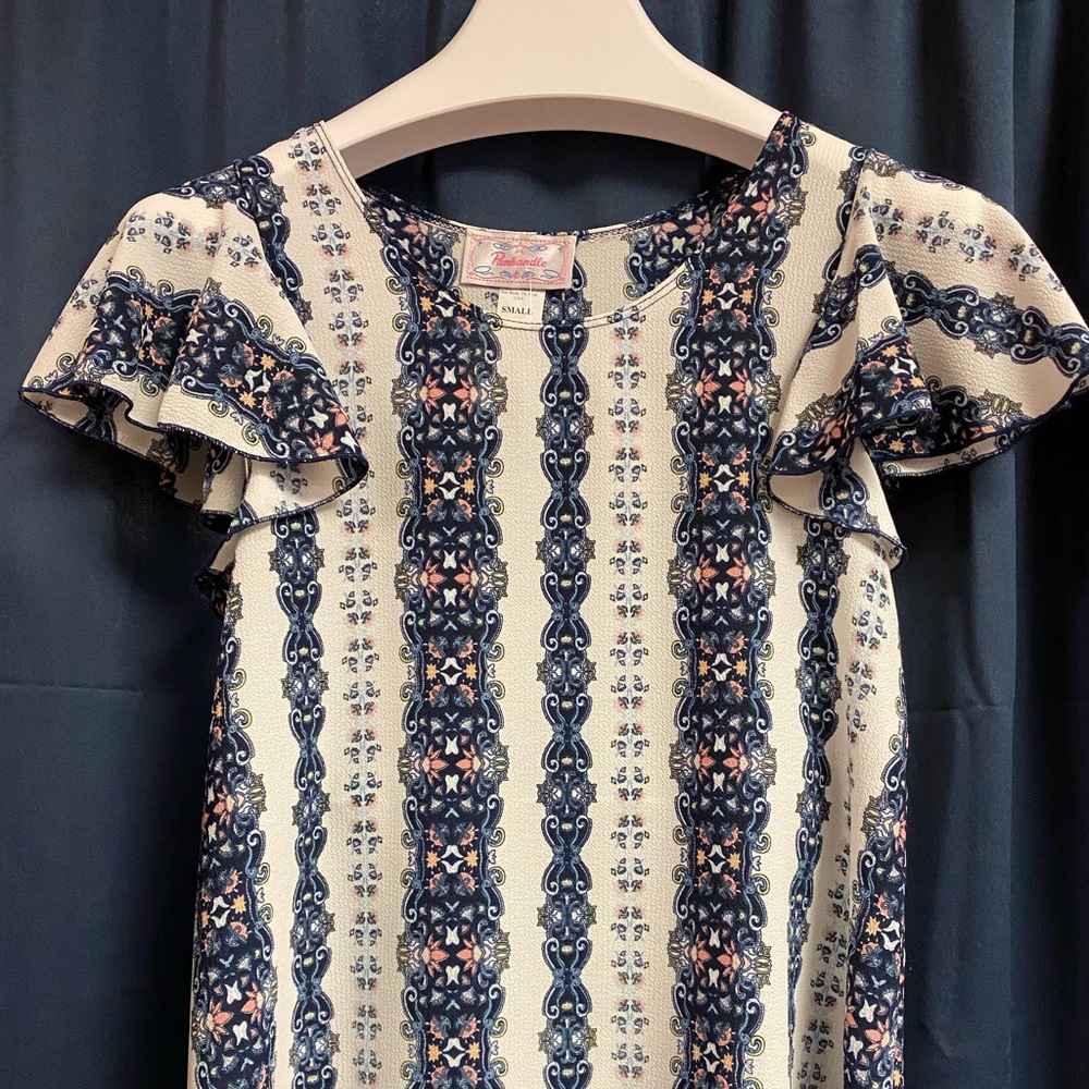 Panhandle ladies flutter sleeve top. Small and Medium available.